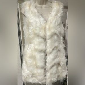 Luxury faux fur vest size small.